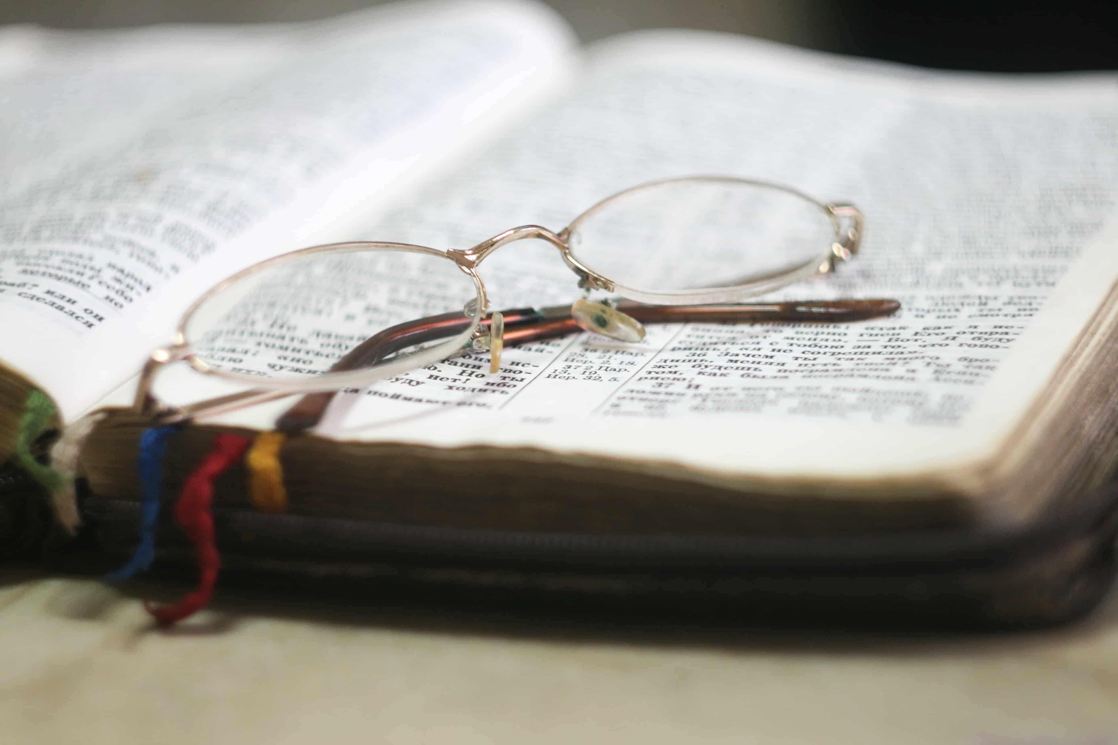 Bible verse and reading glasses