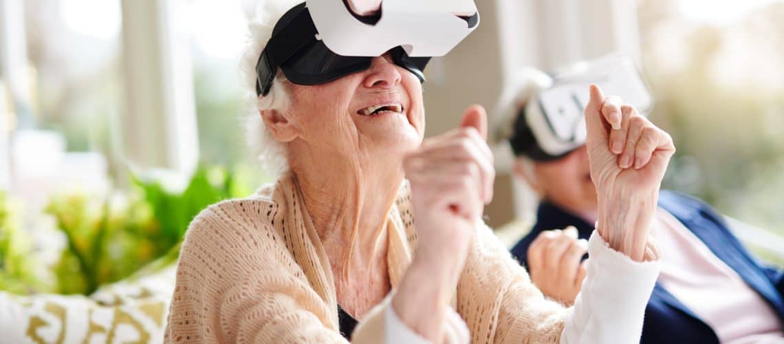 Older adults benefiting from virtual reality headsets.